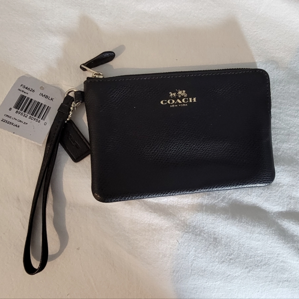 Small black Coach wristlet / pouch